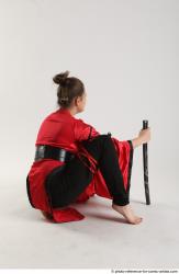Katerina Ninja Kneeling Pose